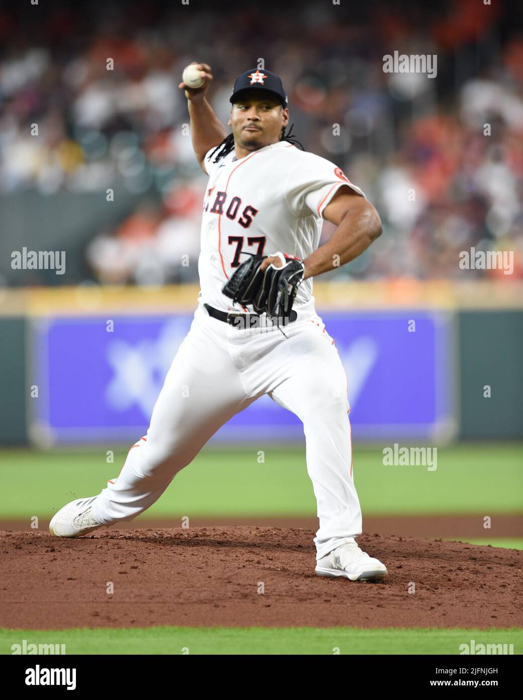 Houston Astros starting pitcher Luis Garcia (77) pitches during the