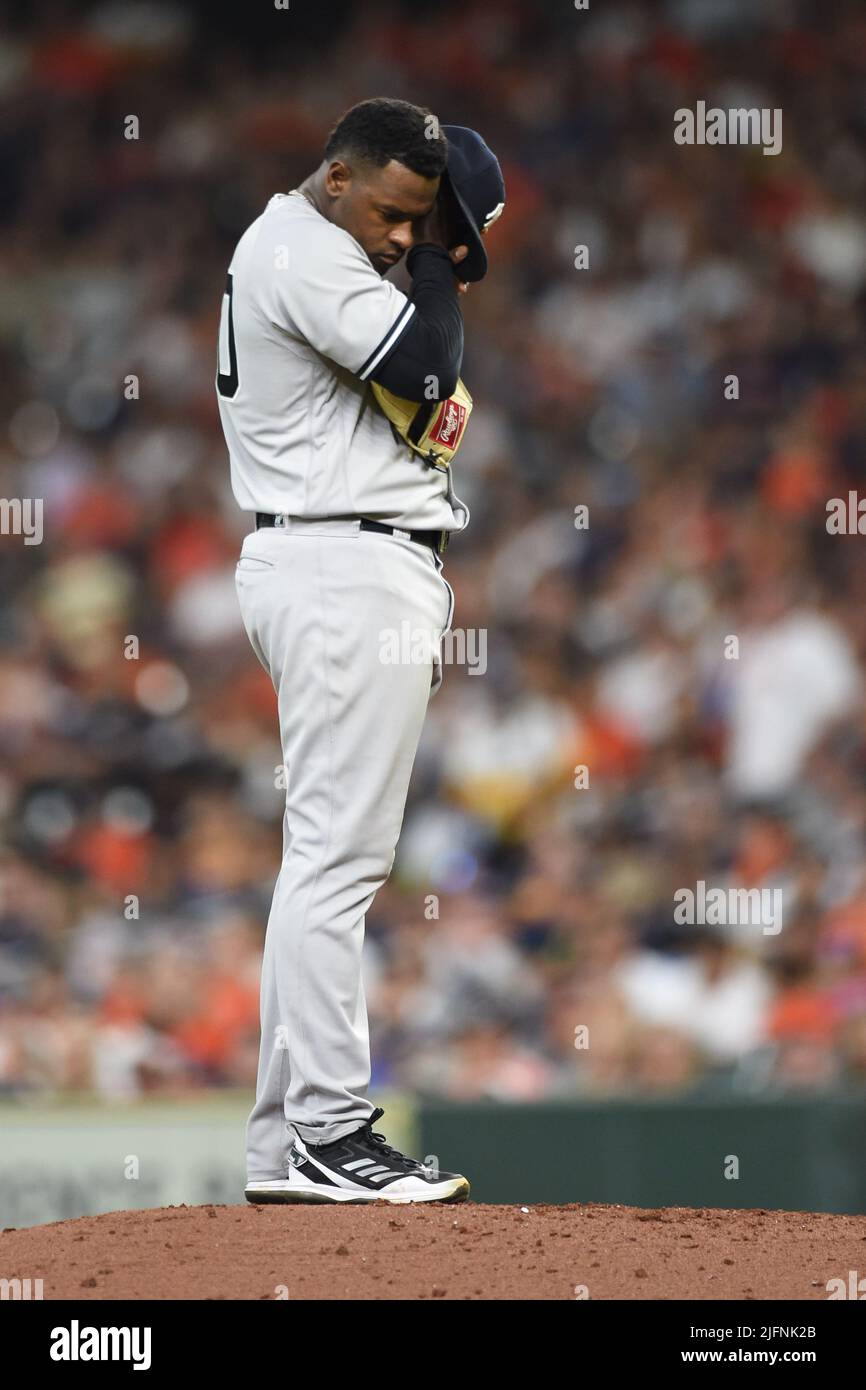 New York Yankees starting pitcher Luis Severino (40) listens to device during the fourth inning