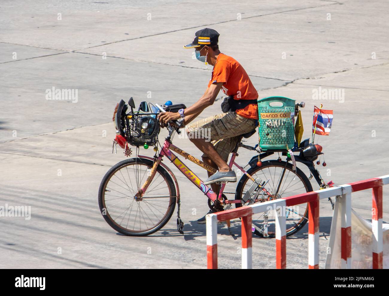 SAMUT PRAKAN, THAILAND, MAR 28 2022, A man ride on a  bicycle with individually design Stock Photo