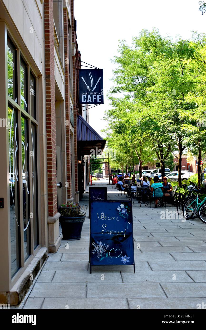 Small town street with cafes and restaurants, people eating outside, Franklin, Indiana. Stock Photo