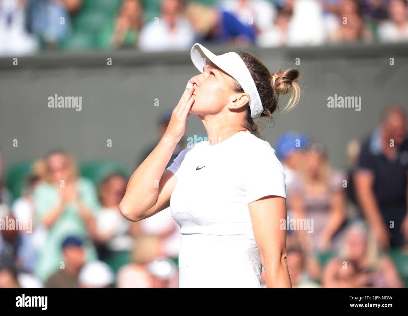 London, UK. 04th July, 2022. Roumanian Simon Halep in action in her fourth round match against Spain's Paula Badosa on day eight of the 2022 Wimbledon championships in London on Monday, July 04, 2022. Halep won the match 6-1, 6-2. Photo by Hugo Philpott/UPI Credit: UPI/Alamy Live News Stock Photo