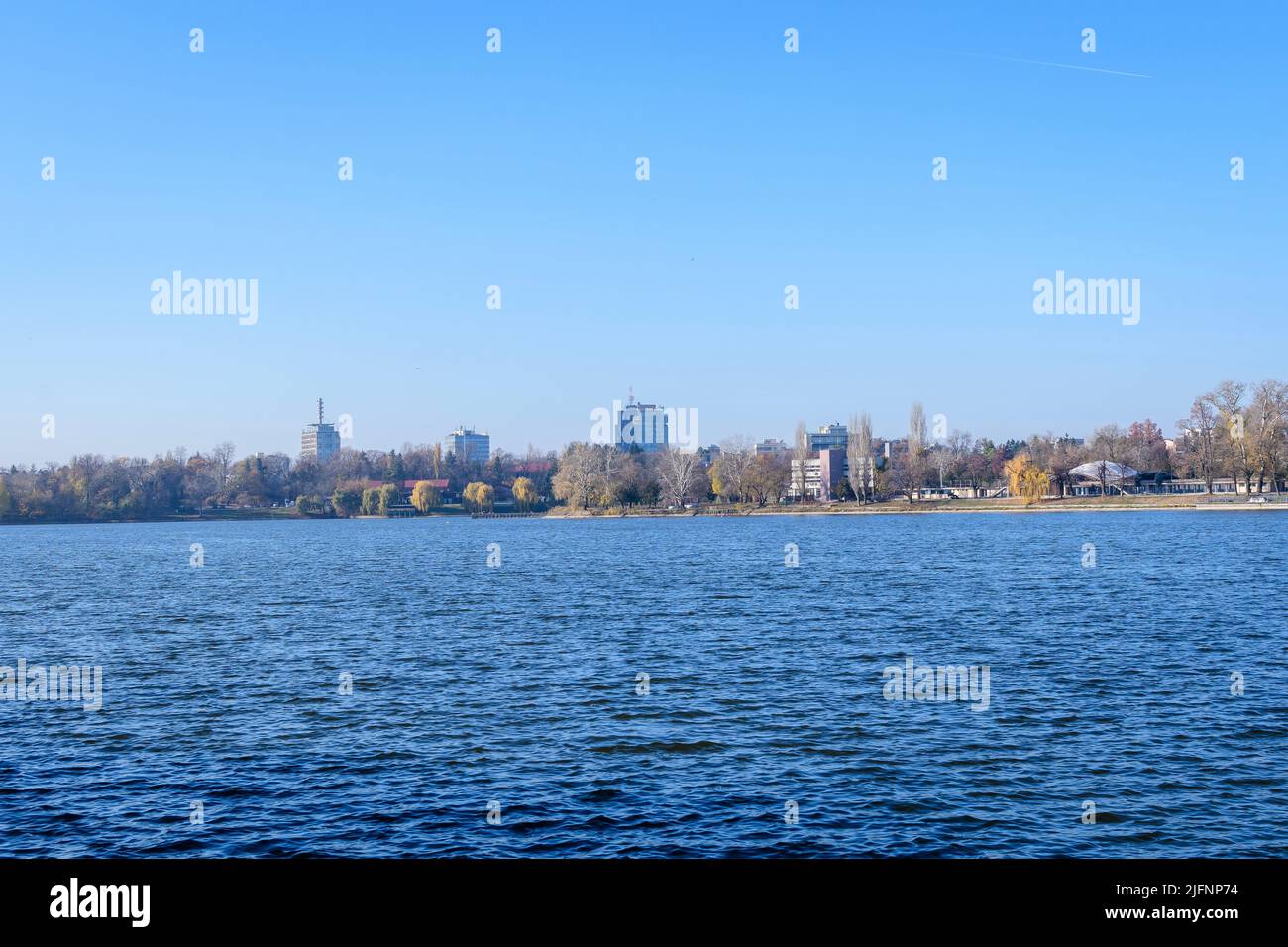 Bucharest, Romania, 21 November 2021: Landscape with trees and the lake ...