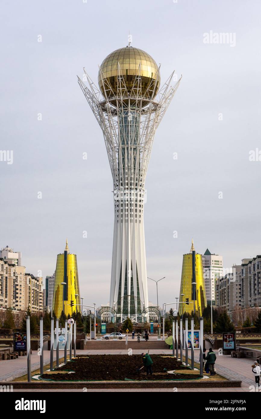 Nur Sultan (Astana), Kazakhstan, 11.11.21. Baiterek (Bayterek) Tower, landmark of Nur Sultan, symmetrical view along Nurjol Boulevard with two Golden Stock Photo