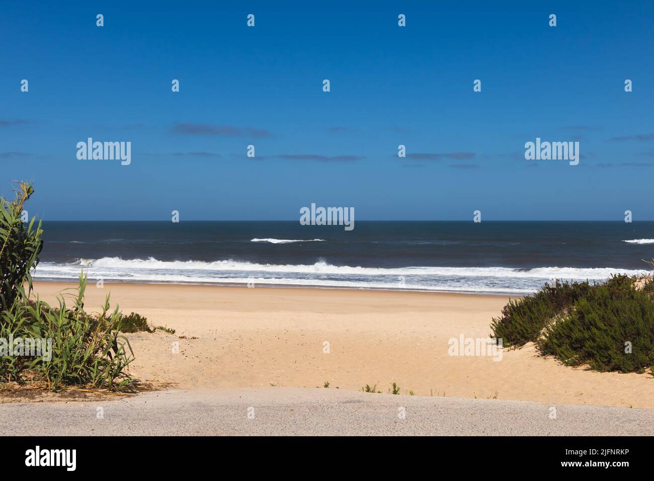 Front view of Praia da Murtinheira, a hidden paradise beach in Figueira da Foz, Portugal. Landscape of the Atlantic Ocean coast with sandy shore Stock Photo