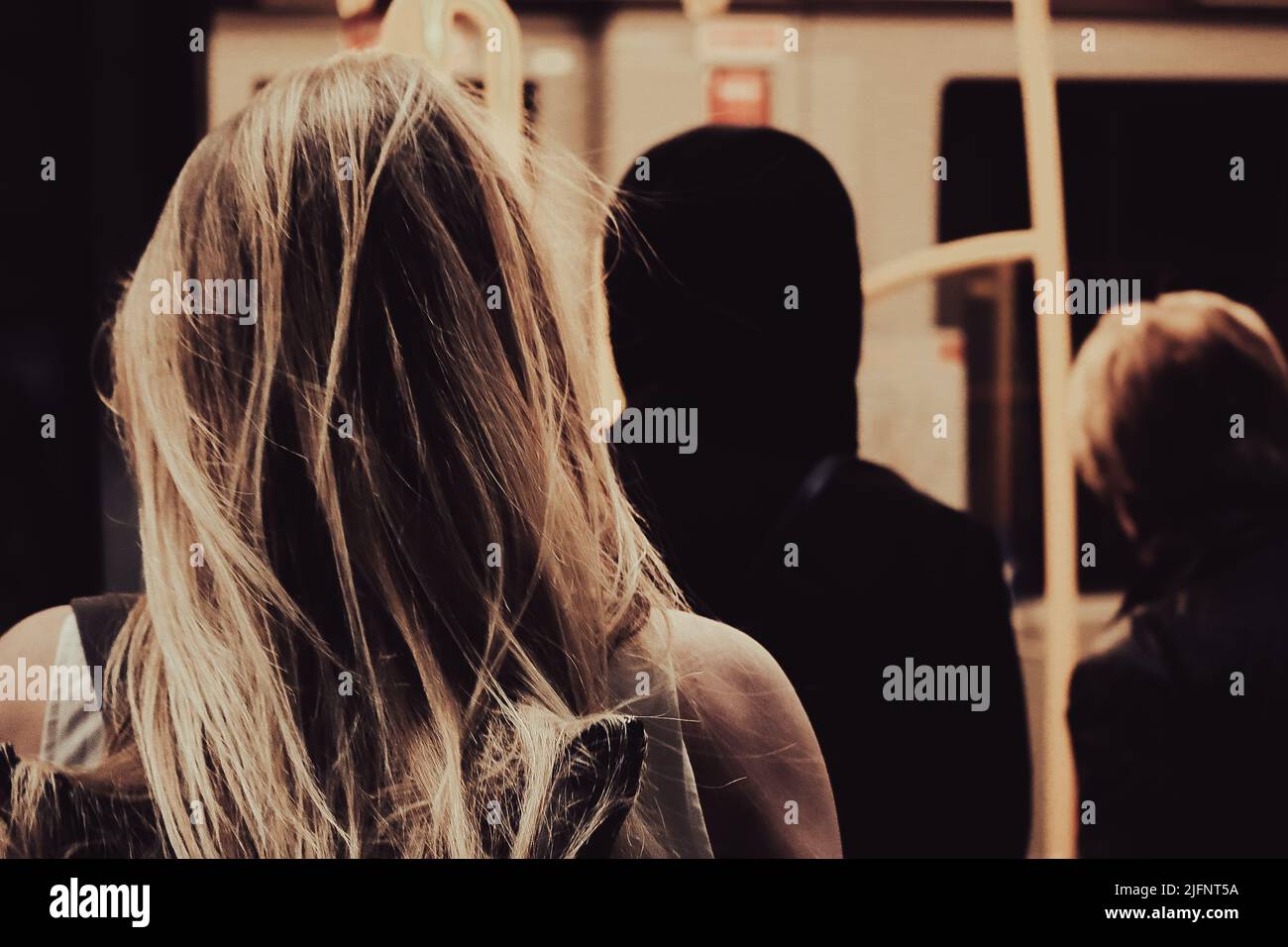 A back view of blonde woman in the metro in Vienne, Austria Stock Photo ...
