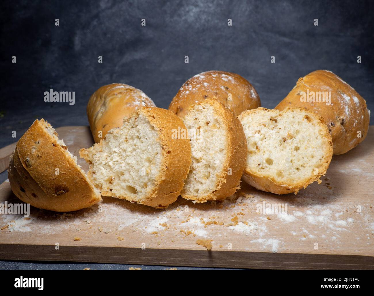 Buns stuffed with onions. Lush flour products. Hearty food. Unhealthy food. At the bakery. cut