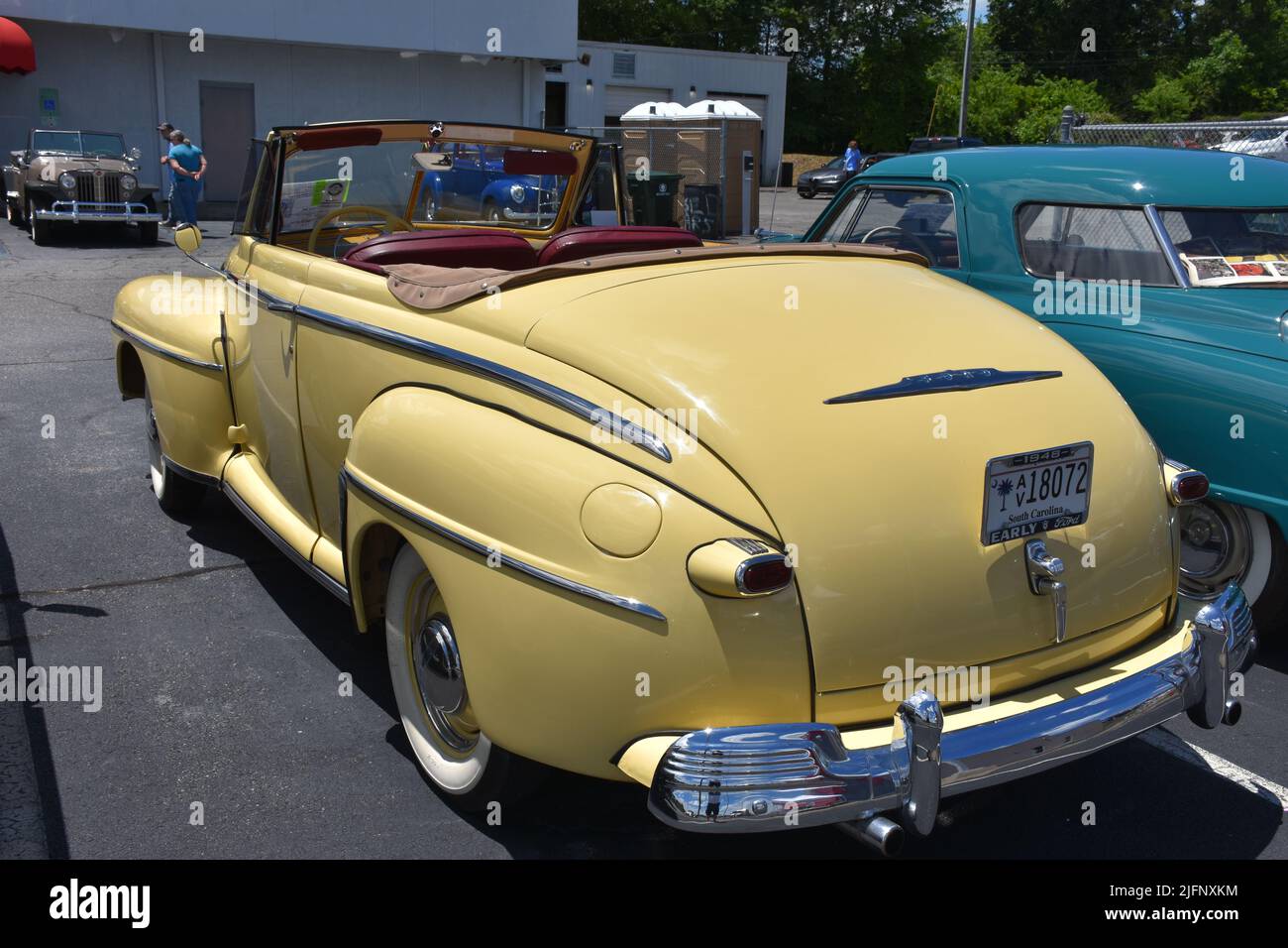 A 1948 Ford V8 Convertible on display at a car show. Stock Photo