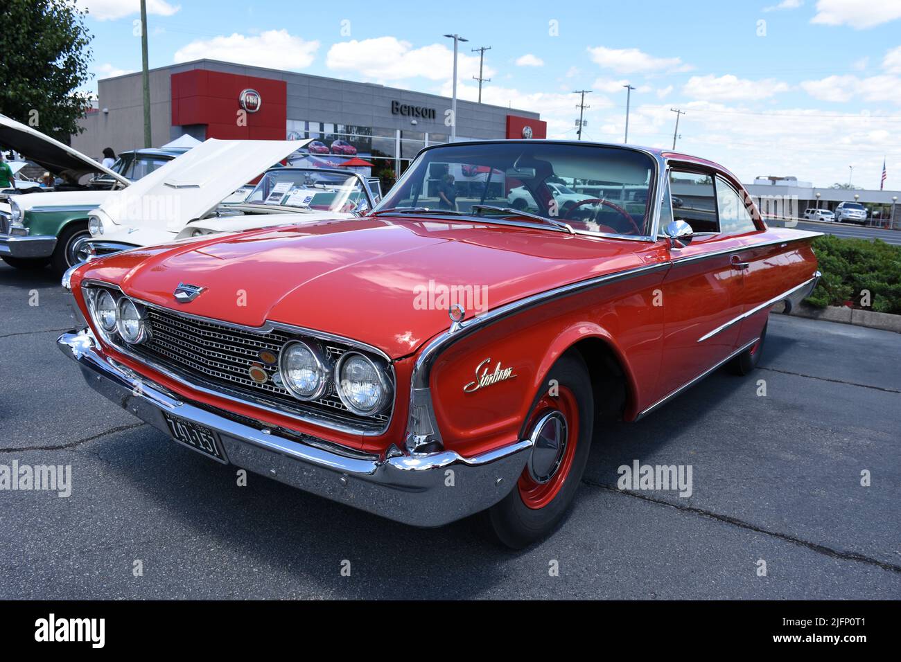 A 1960 Ford Starliner Hard Top on display at a car show. Stock Photo