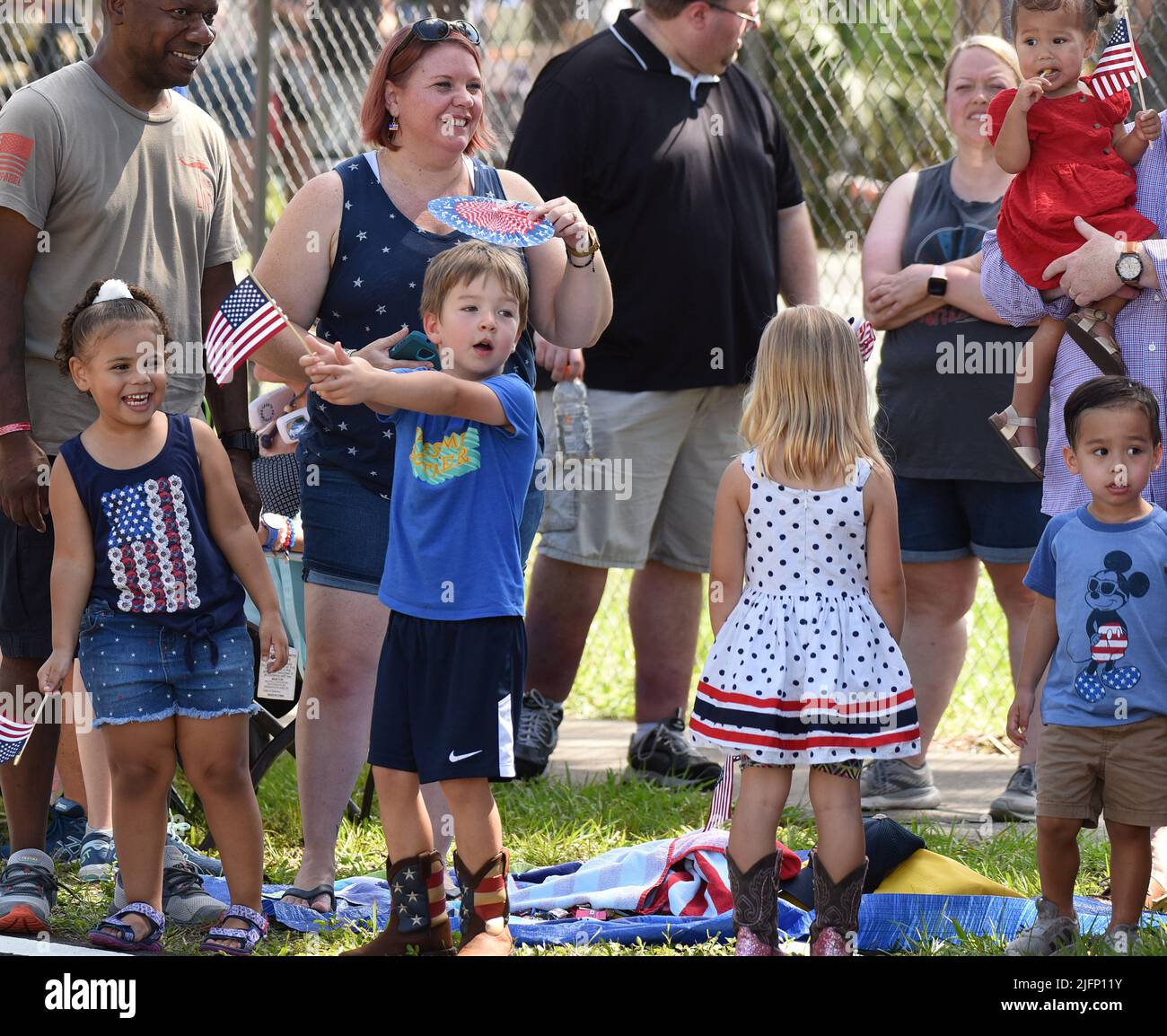 People watch the annual Fourth of July parade in Geneva. The yearly