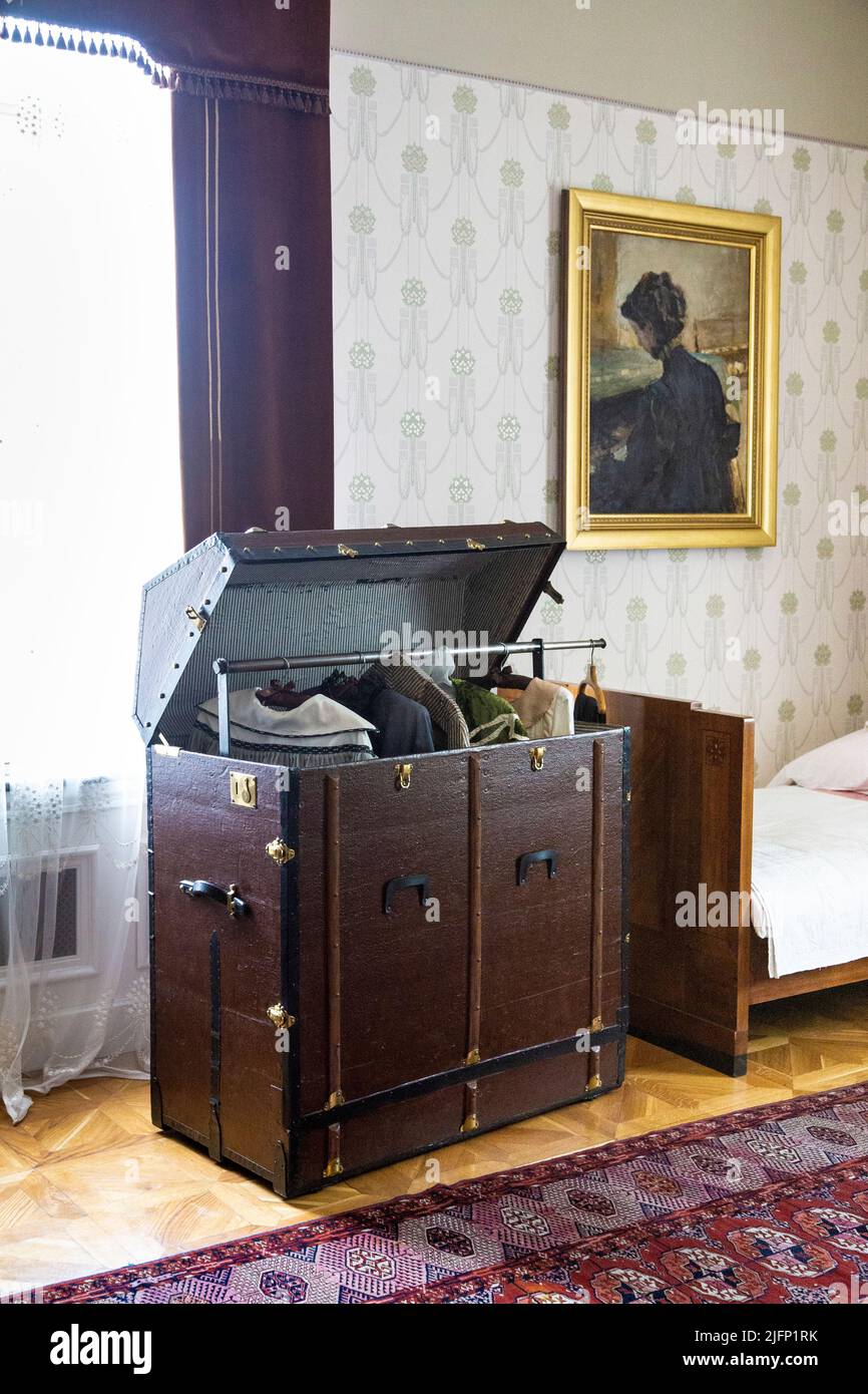 Antique wardrobe travel trunk inside a bedroom at Herbst Palace Museum (Muzeum Pałac Herbsta