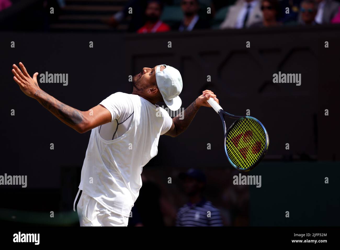 Australia's Nick Kyrigos serving to American Brandon Nakashima during their fourth round match on Center Court today at Wimbledon. Kyrgios won the match in five sets. Credit: Adam Stoltman/Alamy Live News Stock Photo