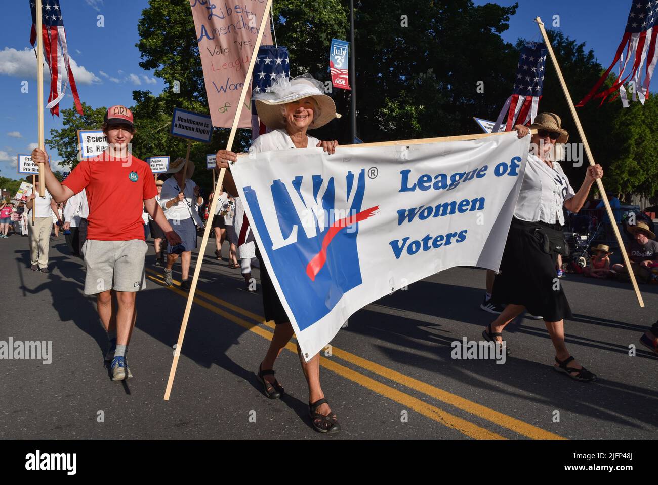 League of Women Voters marchers in July 4 parade, Montpelier, VT, USA. Sign refers to amendment to enshrine abortion rights in Vermont constitution. Stock Photo