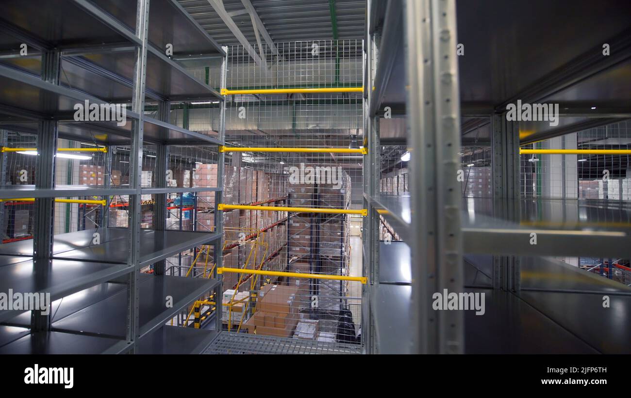 Russia Moscow February 24, 2022 Empty iron shelves in warehouse