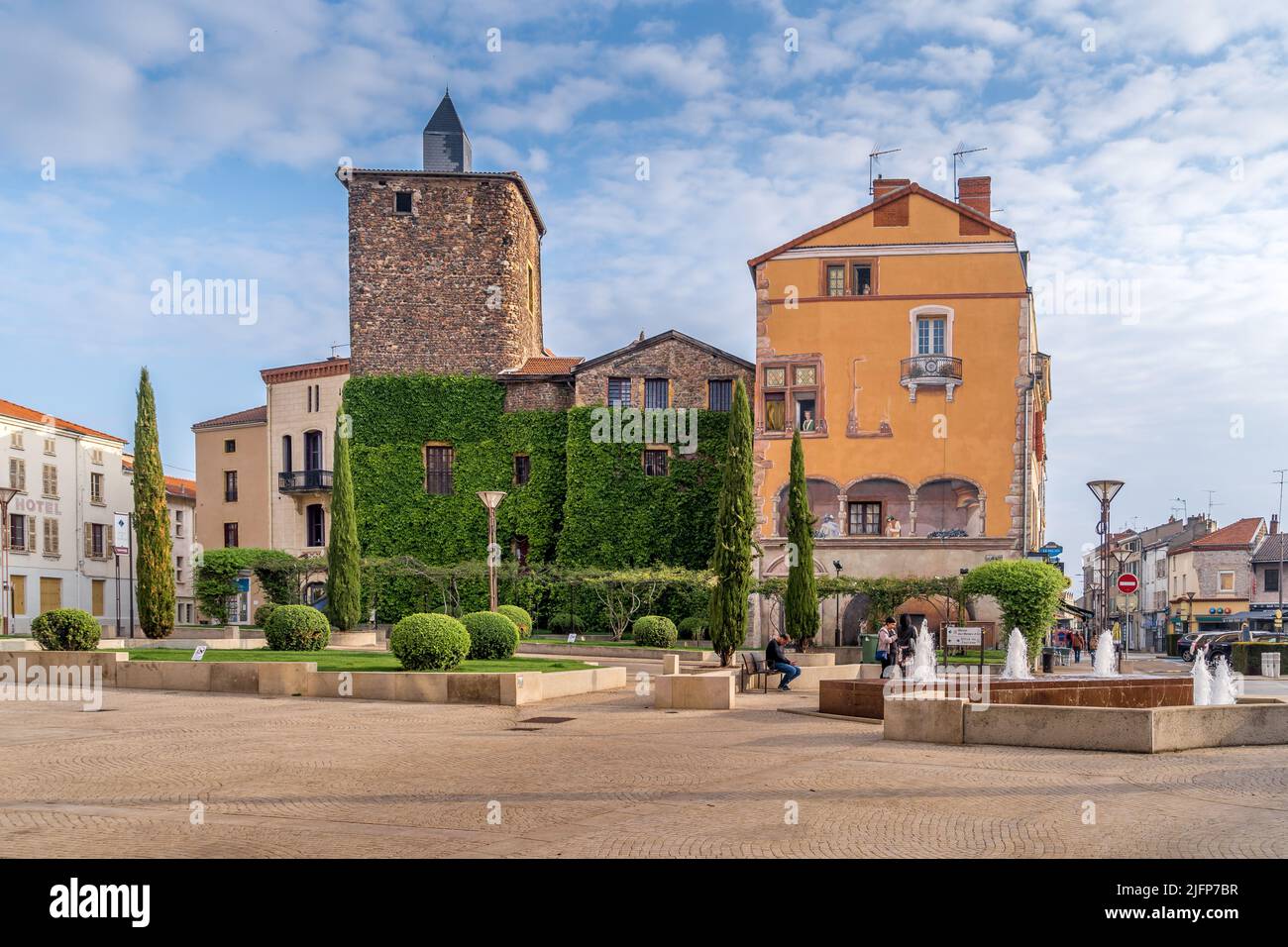 Aerial view of downtown Roanne in France with yellow church, old castle