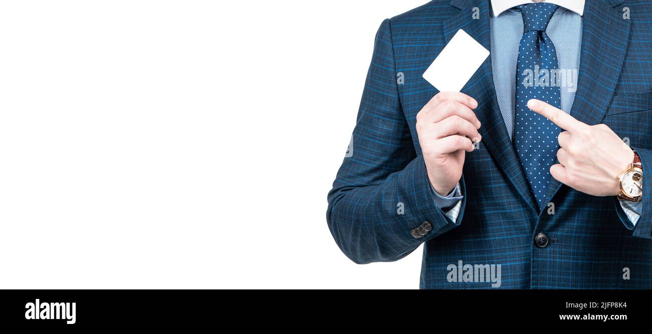 cropped man in suit pointing finger on empty debit or business card for copy space, advertisement. Horizontal poster design. Web banner header, copy Stock Photo