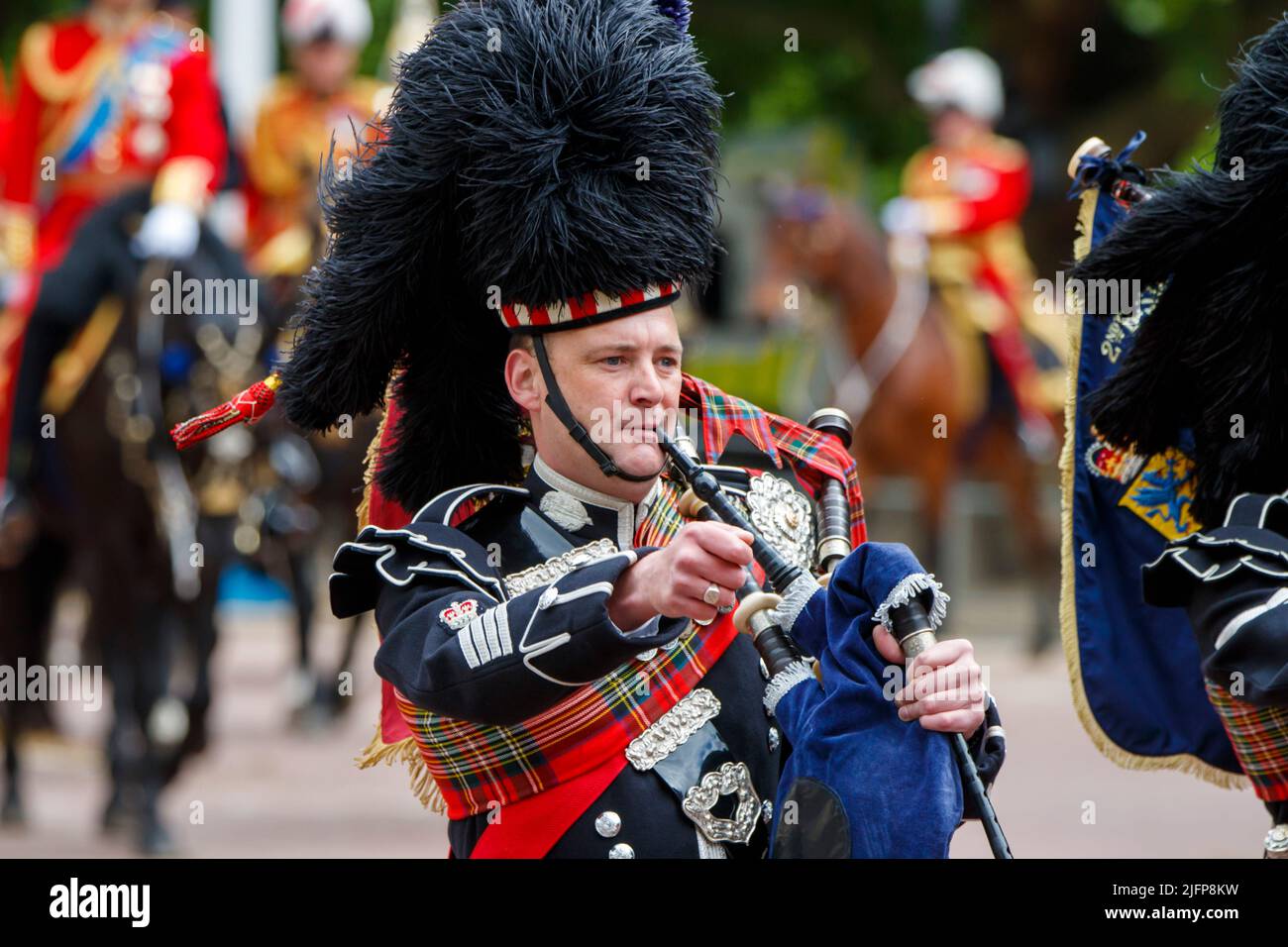 Scots Guards musician at Trooping the Colour, Colonel’s Review in The Mall, London, England, United Kingdom on Saturday, May 28, 2022. Stock Photo
