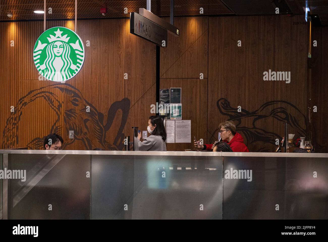 Hong Kong, China. 28th Jan, 2022. Customers are seen at the American multinational chain Starbucks Coffee store in Hong Kong. (Credit Image: © Budrul Chukrut/SOPA Images via ZUMA Press Wire) Stock Photo
