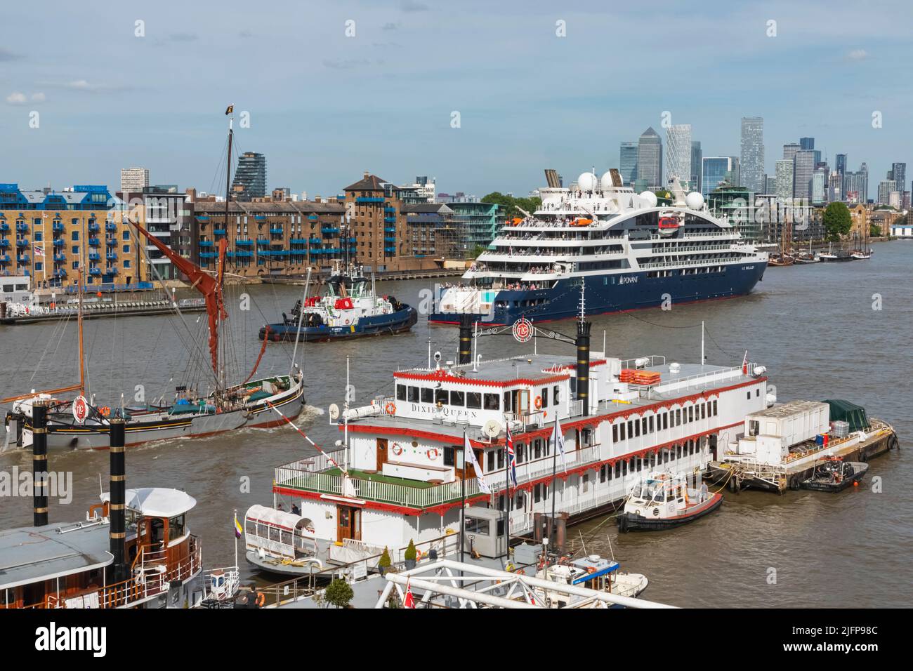 Boats on the River Thames with Canary Wharf Skyline in the Backkground ...