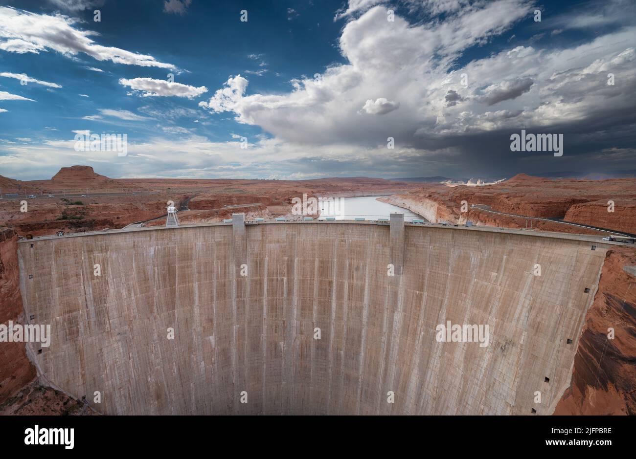 Page, Arizona, USA. 30th June, 2022. A view of the Glen Canyon Dam at Lake Powell on June 30, 2022 in Page, Arizona. As severe drought grips parts of the Western United States, water levels at Lake Powell have dropped to their lowest level since the lake was created by damming the Colorado River in 1963. The Colorado River Basin connects Lake Powell and Lake Mead and supplies water to 40 million people in seven western states. (Credit Image: © David Becker/ZUMA Press Wire) Stock Photo