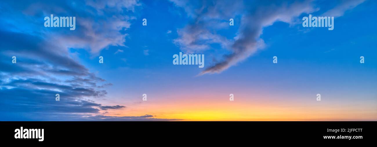 A Detailed Image Of White Fluffy Clouds Set Against A Blue Daytime Sky In Banner Image Format Stock Photo