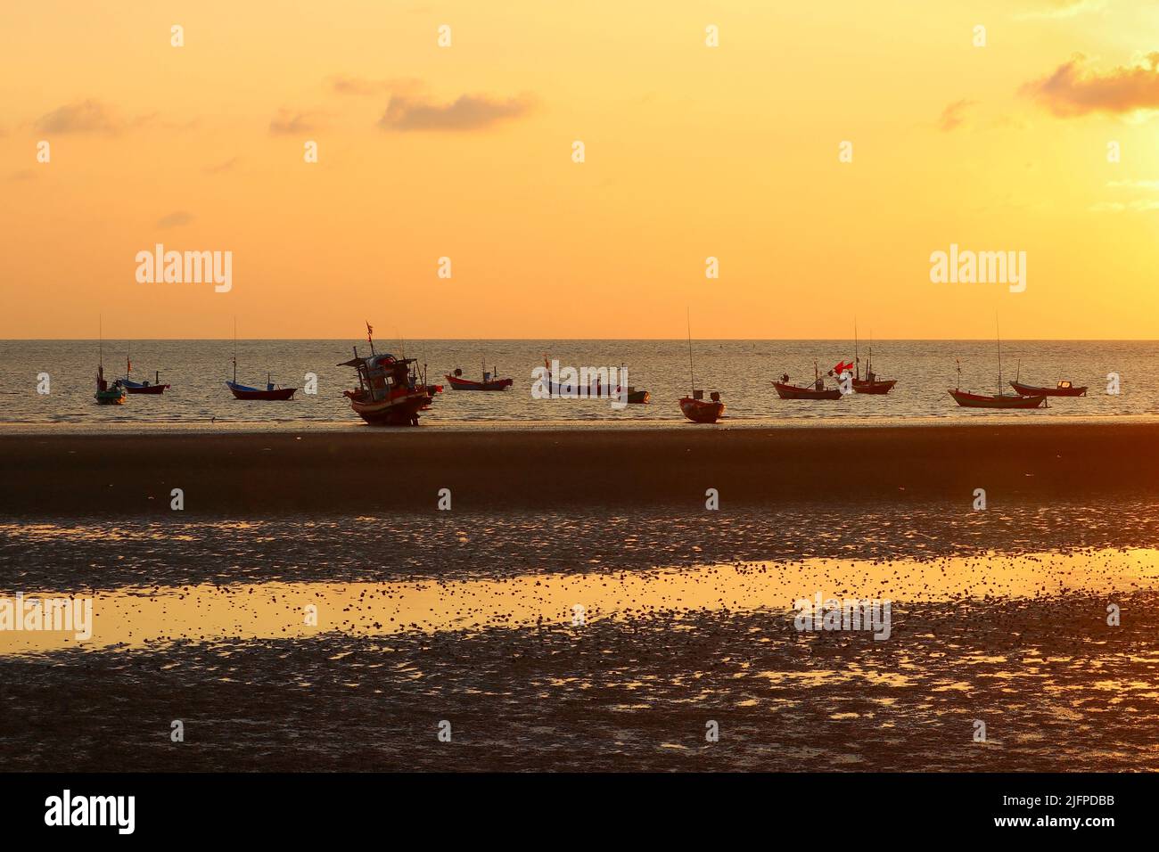 fishing boat in the sea with beautiful sky background Stock Photo