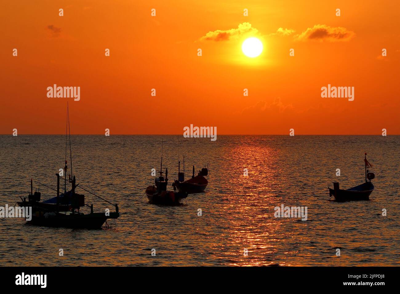 fishing boat in the sea with beautiful sunset background Stock Photo ...