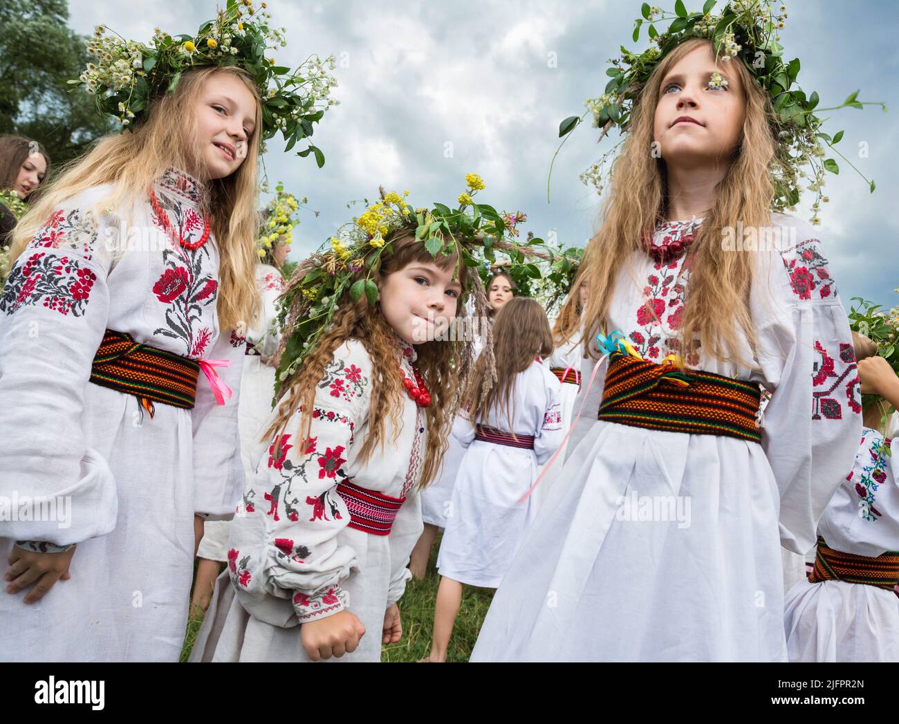 Teenage girls in Ukrainian national clothes and traditional flower