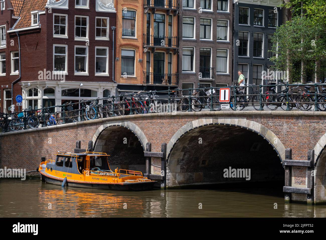 Amsterdam, The Netherlands - 21 June 2022: Old bridge in central Amsterdam Stock Photo