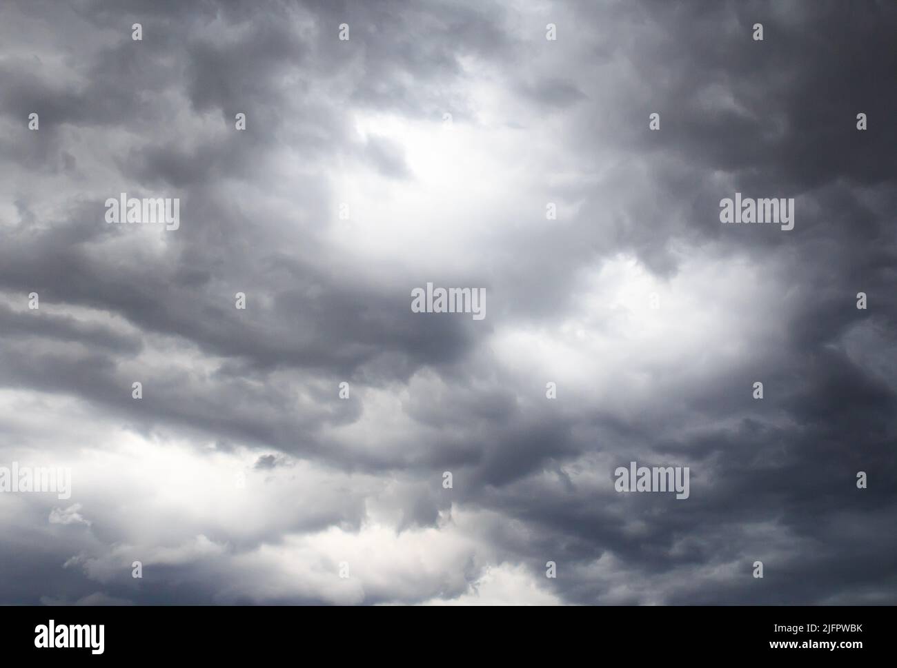 Dark storm clouds before rain, with strange cloud shapes Stock Photo
