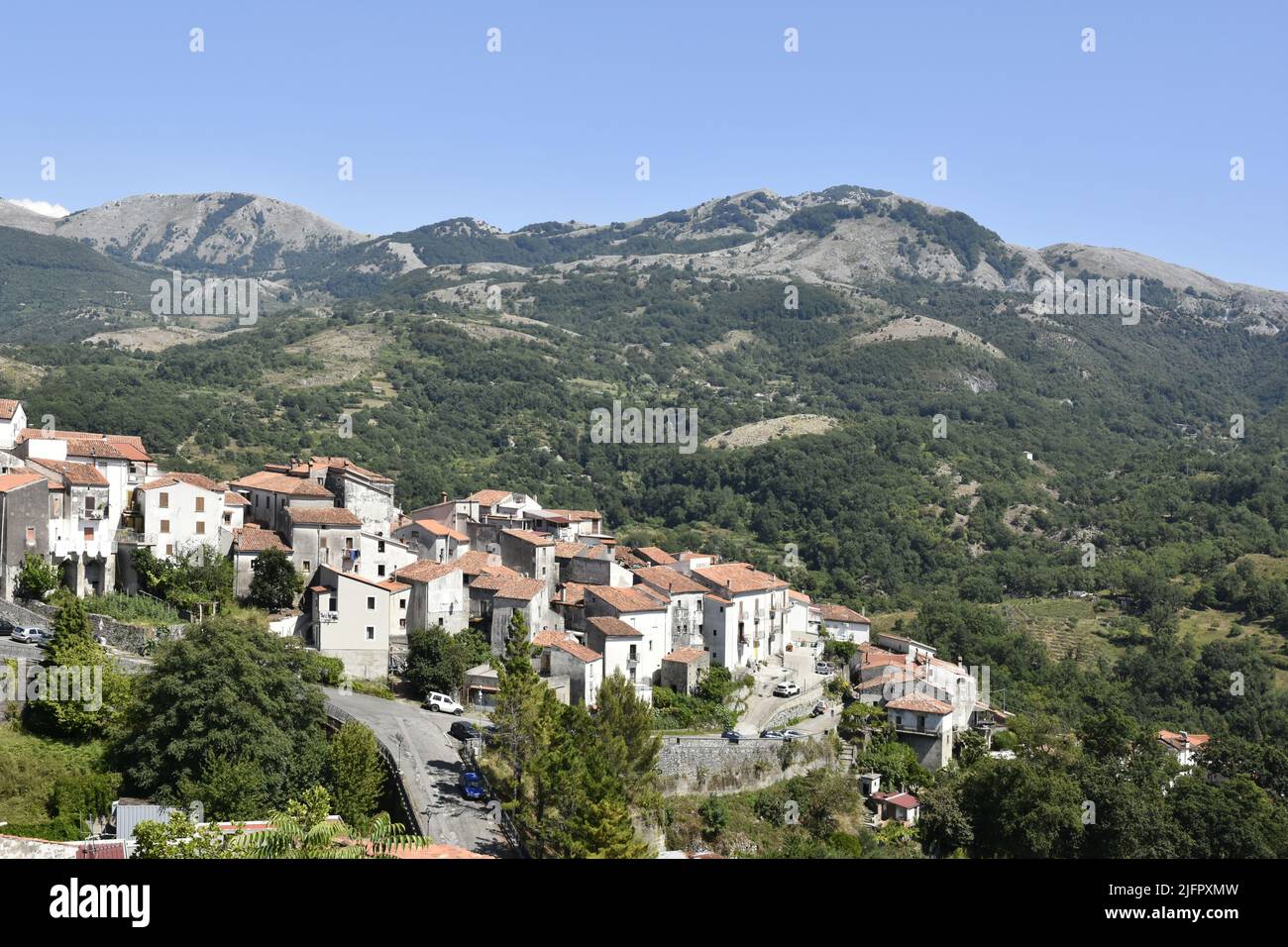 A high angle of a narrow street and old houses in Aieta village, the
