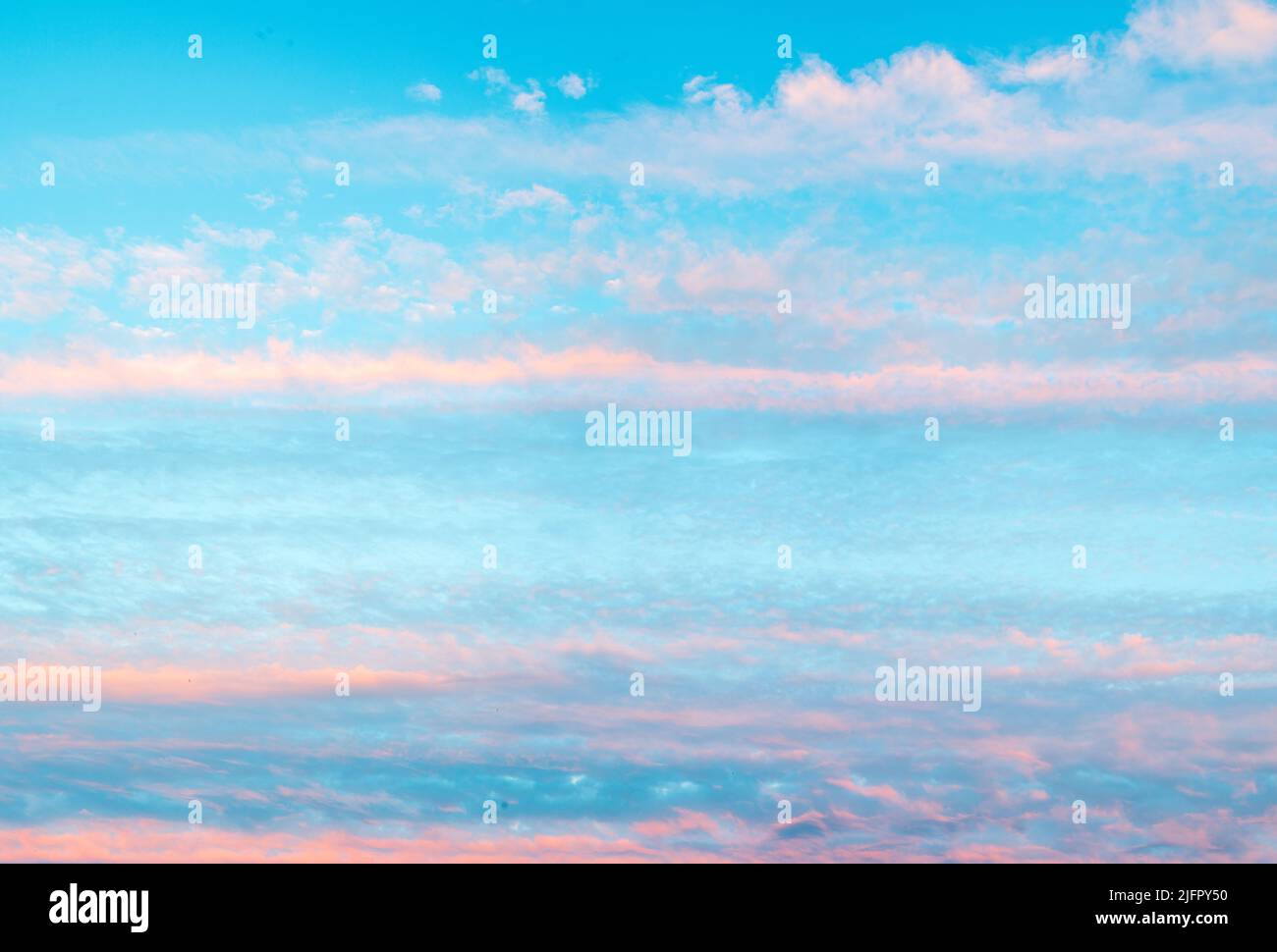 Panorama of sky with pink clouds at sunset or sunrise. Abstract ...