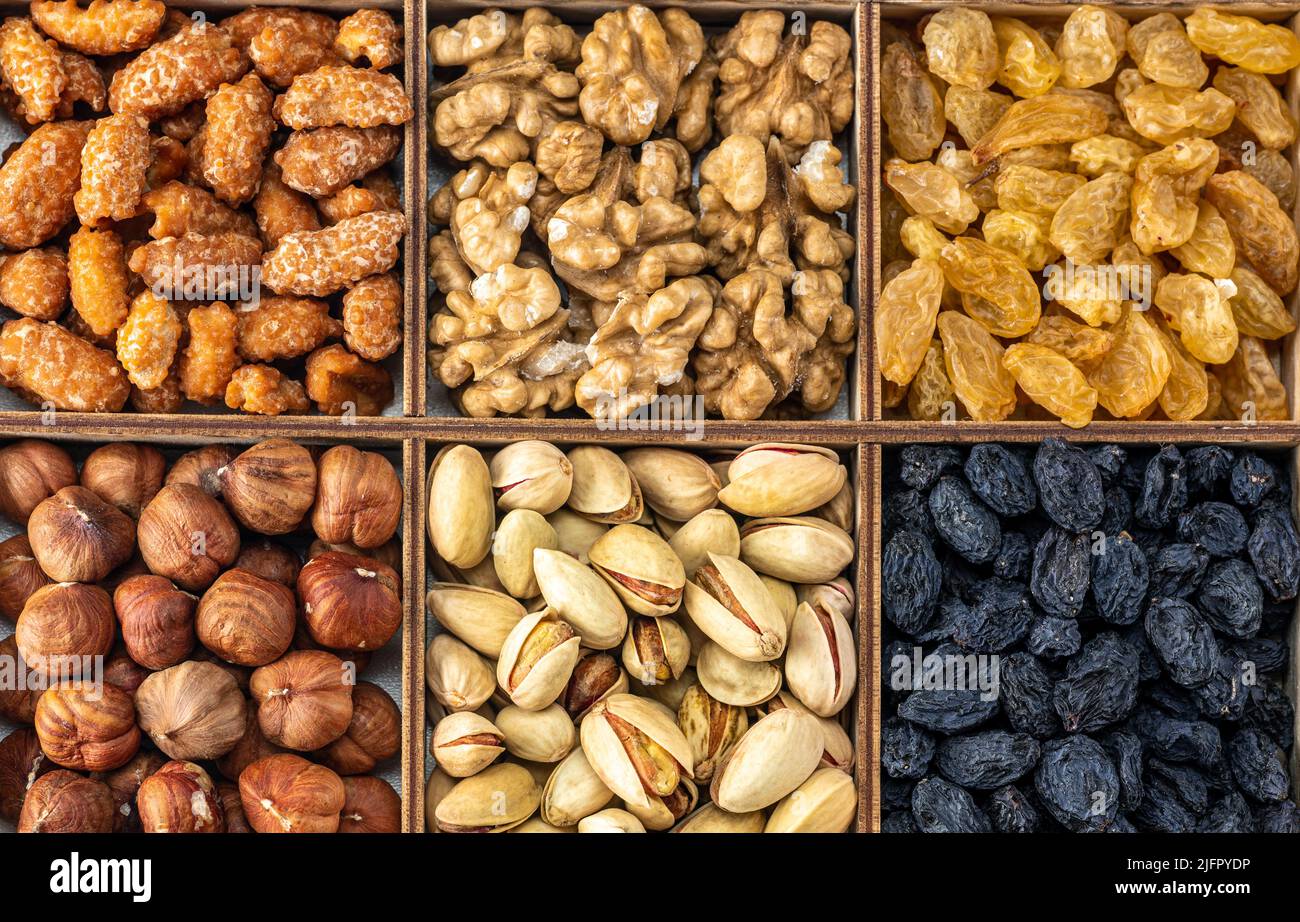 assorted dried fruits, nuts and seeds, top view. healthy food