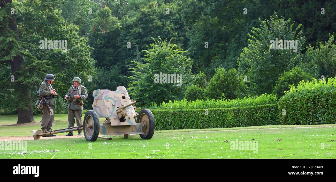 World War  2  German Pak36 Anti - Tank Gun  with 2 men in German uniform. Stock Photo