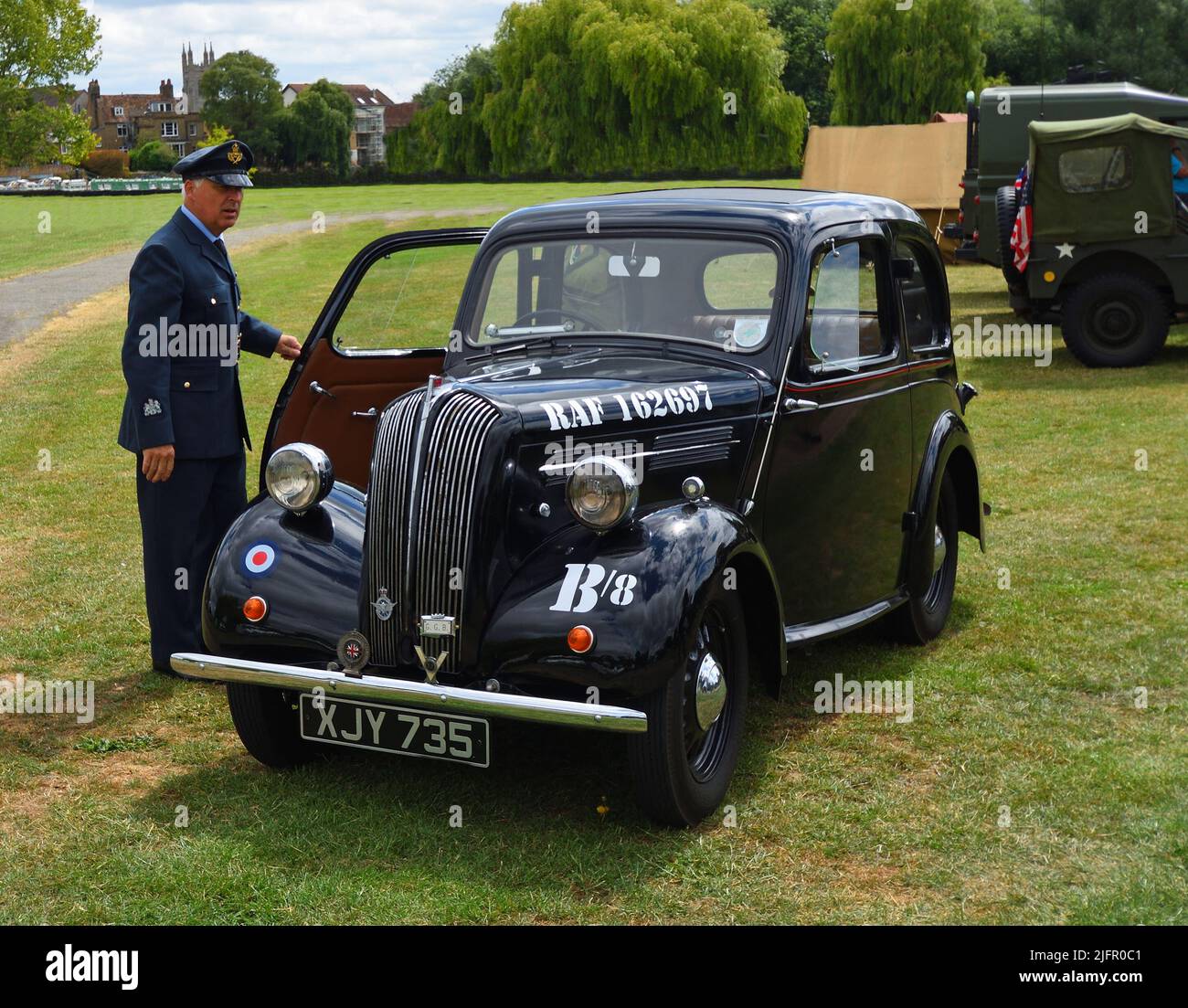 Vintage 1939 Standard Flying 8 with RAF markings and man in RAF officers uniform. Stock Photo