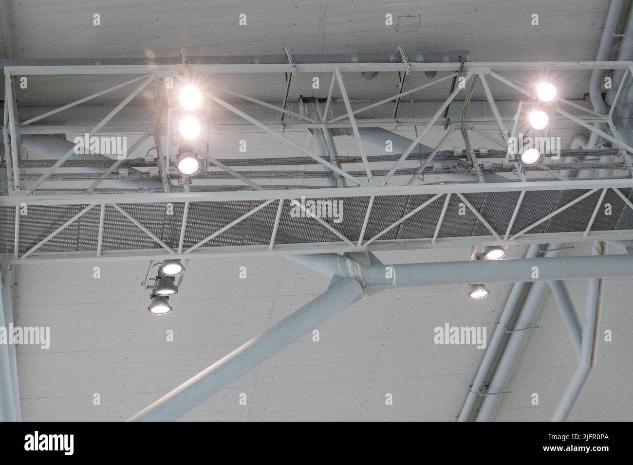 Ceiling with bright lighting in a modern warehouse, shopping center