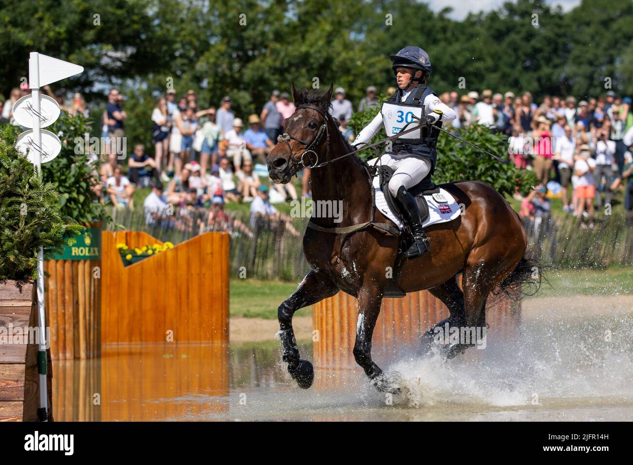 Rosalind CANTER (GBR) on Allstar B, galloping, in the water, action. Allstart B was badly injured at obstacle 16d. On the advice of the vet, the owners have decided to put the horse down. Eventing, Cross-Country C1C: SAP-Cup, on July 2nd, 2022, World Equestrian Festival, CHIO Aachen 2022 from June 24th to - 03.07.2022 in Aachen/Germany; Stock Photo