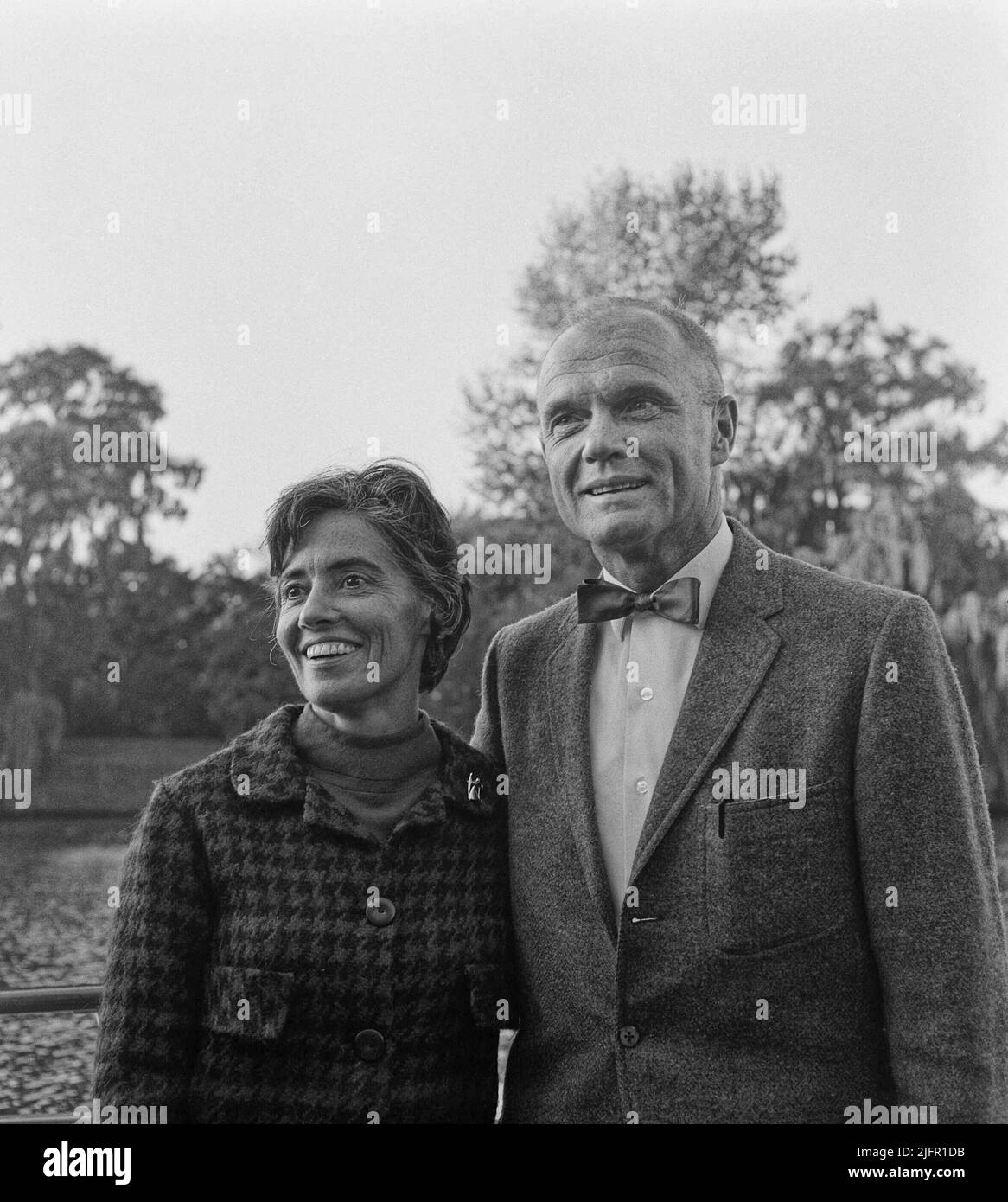 American astronaut John Glenn (right) and wife Annie Glenn pose for a photograph on Saturday, Oct. 9, 1965 at an unknown location in the Netherlands. A distinguished U.S. Marine Corps fighter pilot and one of the National Aeronautics and Space Administration's original seven Project Mercury astronauts, John Glenn made the first supersonic transcontinental flight across the United States in 1957 and became the first American to orbit the Earth in 1962. (Apex MediaWire Photo by Jack de Nijs/Algemeen Nederlandsch Fotobureau) Stock Photo