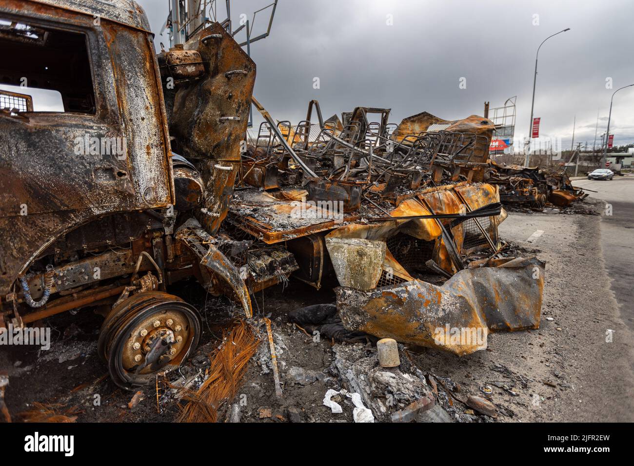 Burnt military vehicles of Russian soldiers on the bridge across the ...