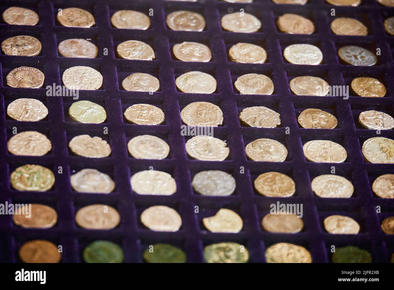 Ancient Roman coins made of metal. Reconstruction of the events of the