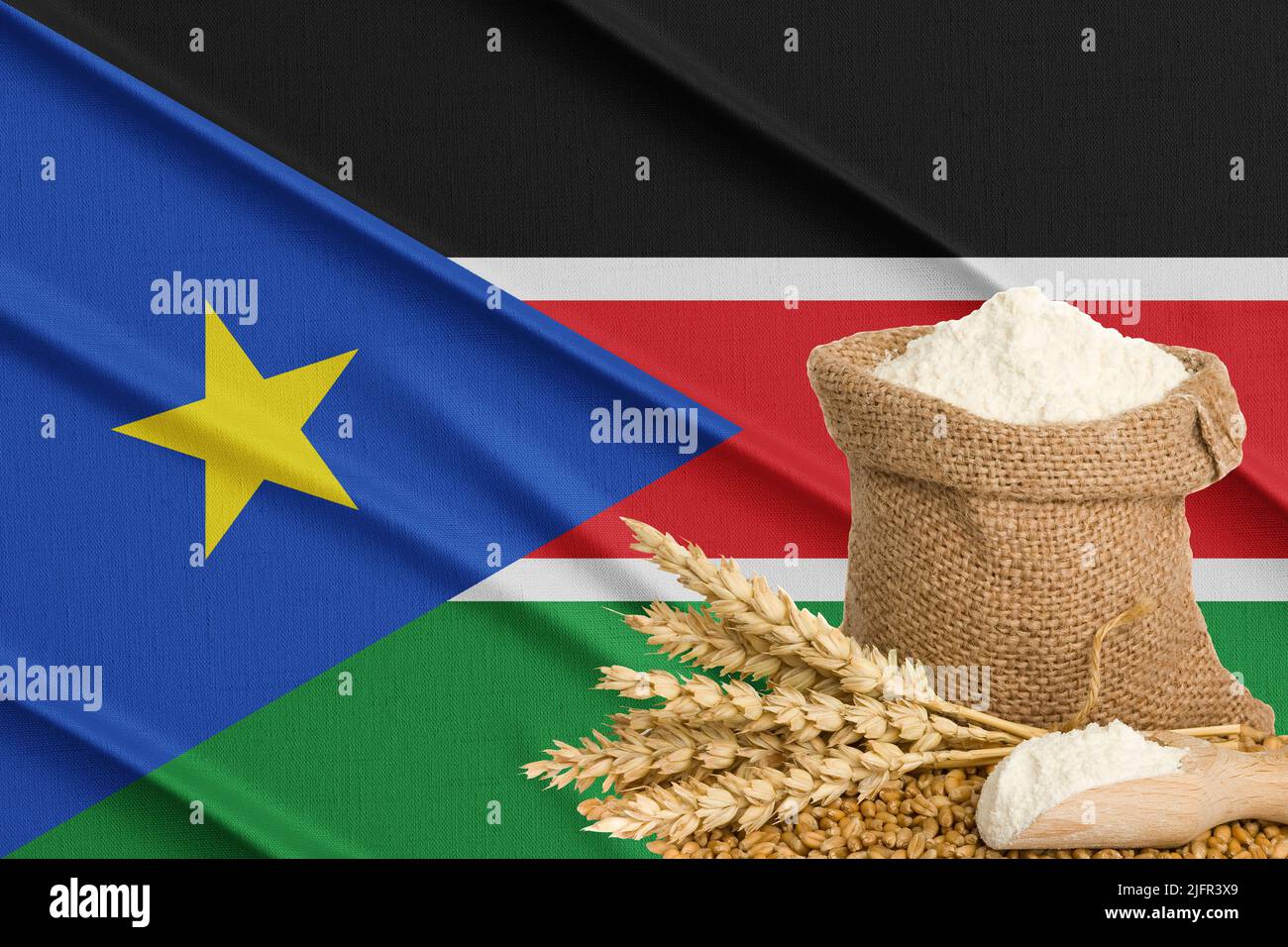South Sudan  grain crisis, Concept global hunger crisis,  On background Flag South Sudan wheat grain. Concept of growing wheat in Russia Stock Photo
