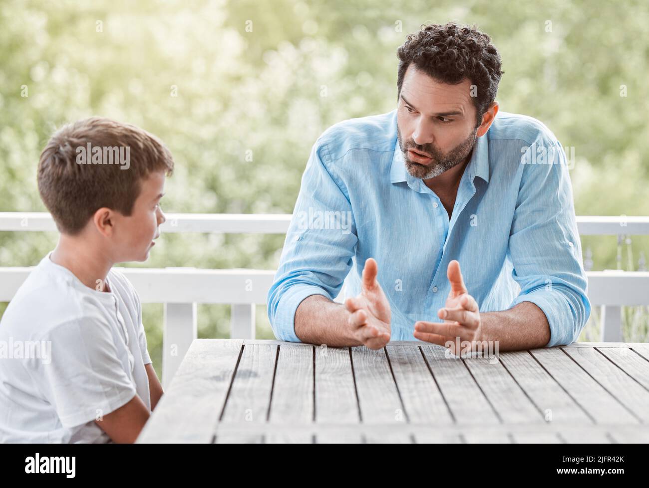 Father talking to son serious hires stock photography and images Alamy