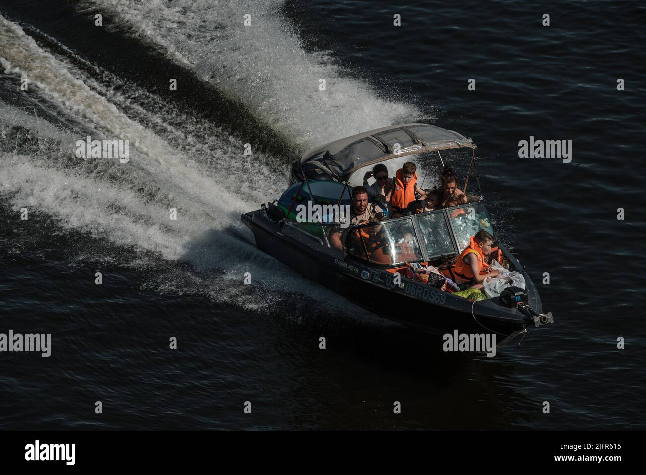 TVER, RUSSIA - JULY 01 2022: Motorboat with people sailing down the Volga Stock Photo