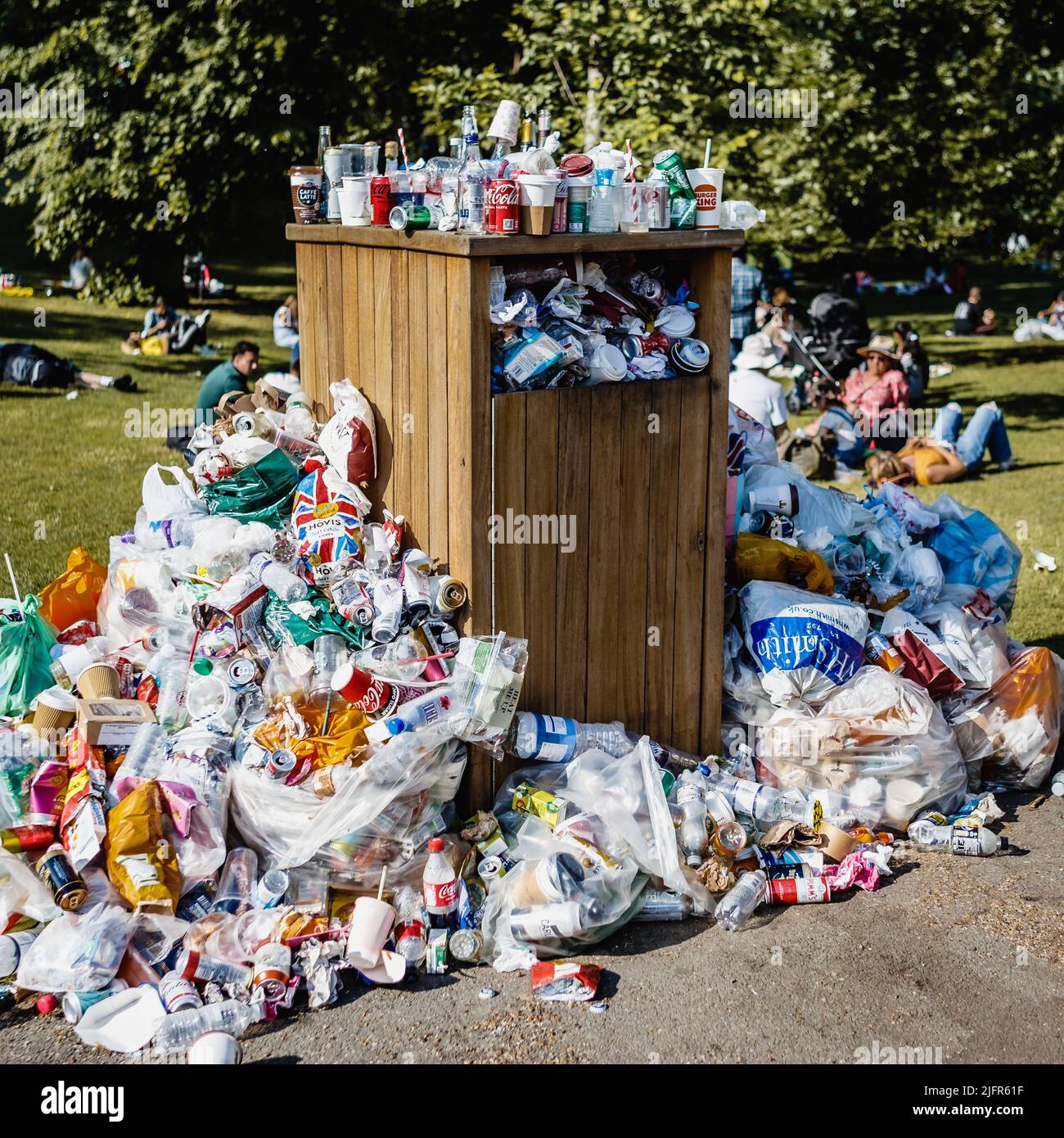 Rubbish in a park in London during the good weather spell Stock Photo