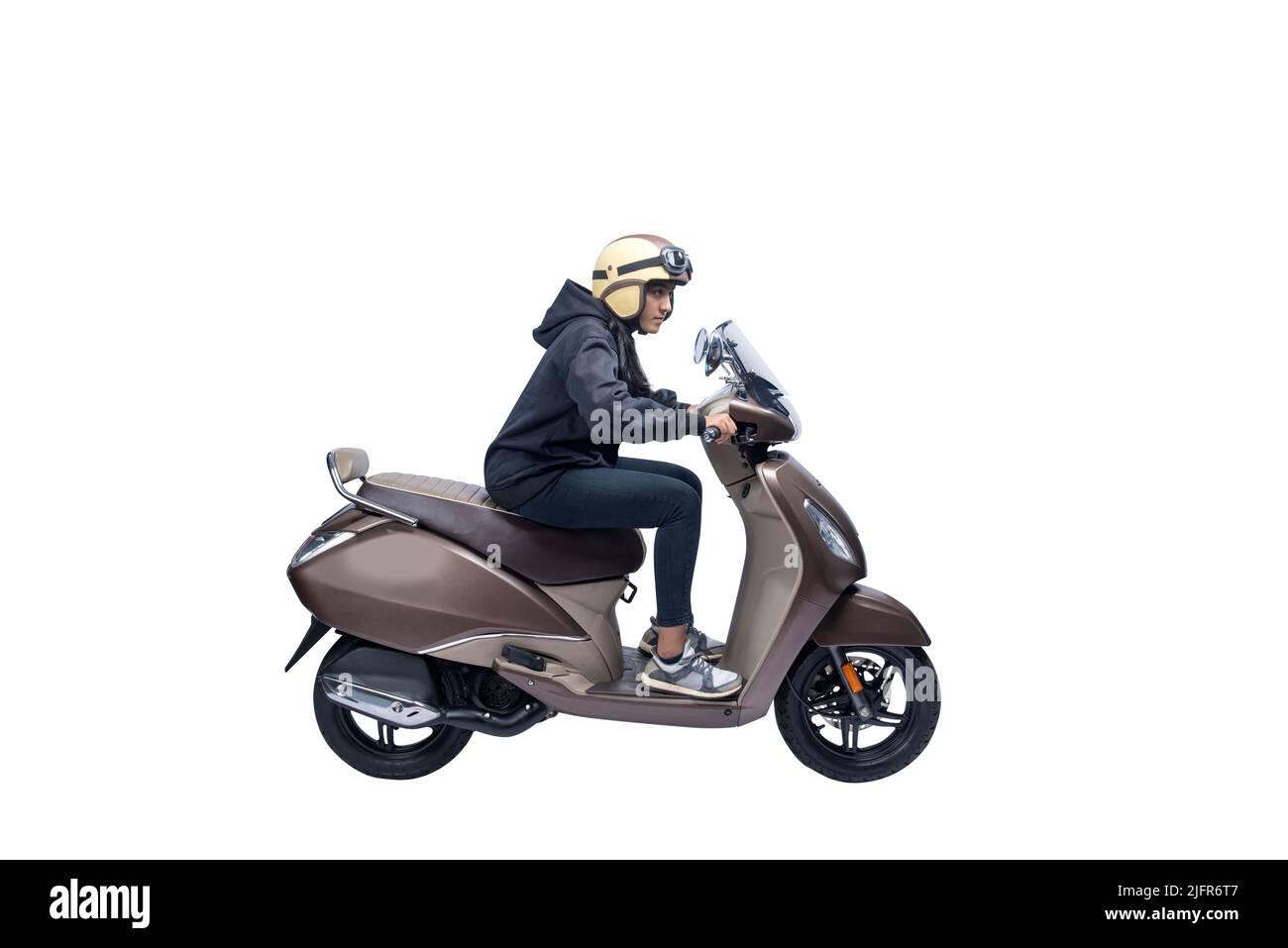 Asian woman with a helmet and jacket sitting on a scooter isolated over white background Stock Photo