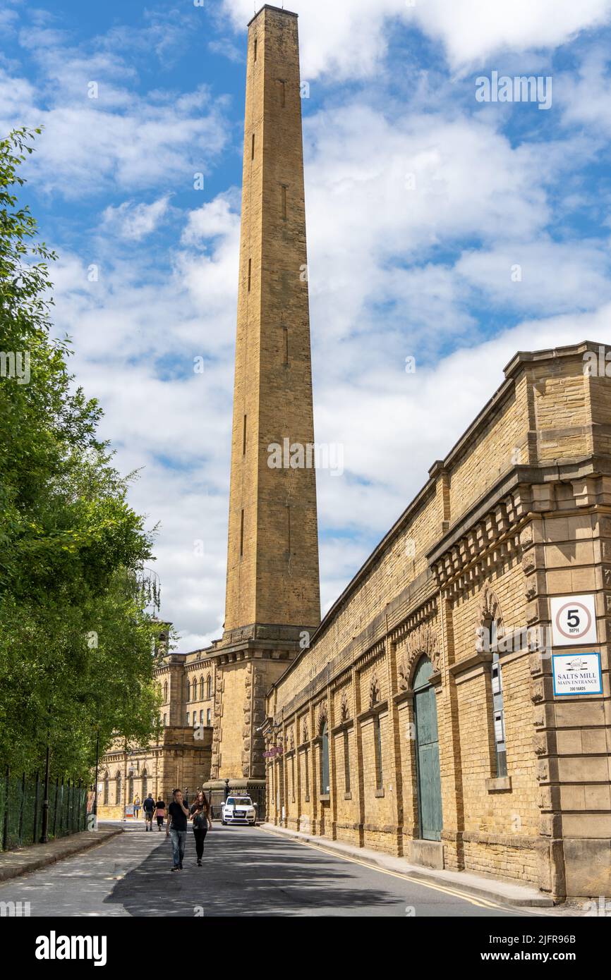 Exterior view of Salts Mill, showing the chimney - a former textile mill, now gallery space, shopping and café in Saltaire, Bradford, UK. Stock Photo