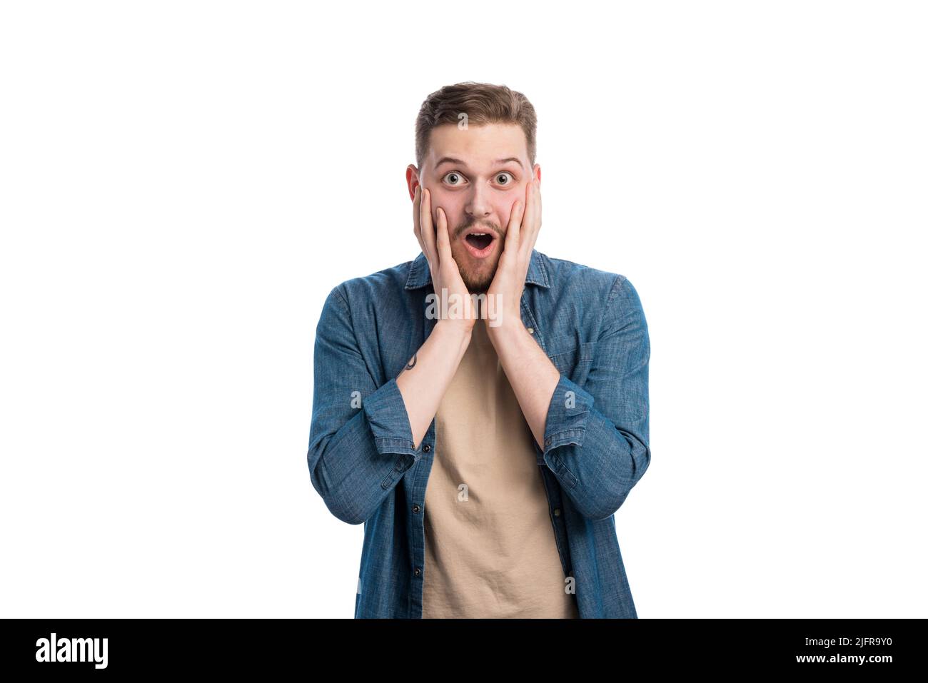 Shocked man in studio Stock Photo