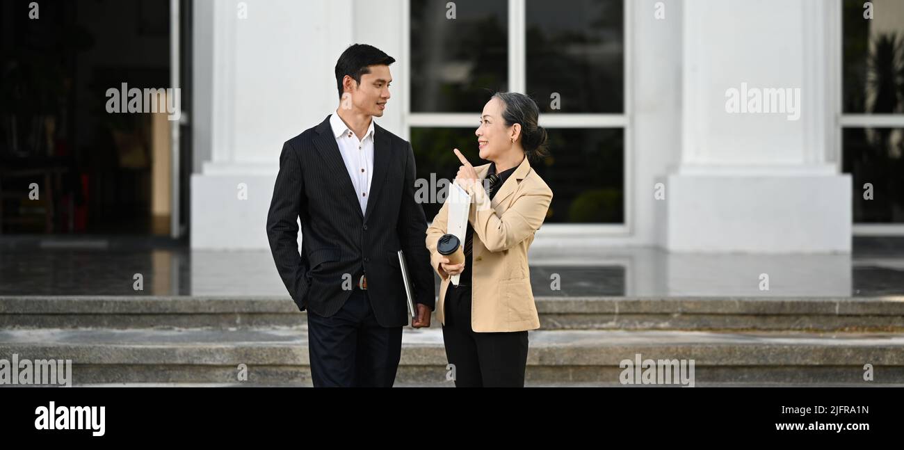 Wearing formal suits hi-res stock photography and images - Alamy