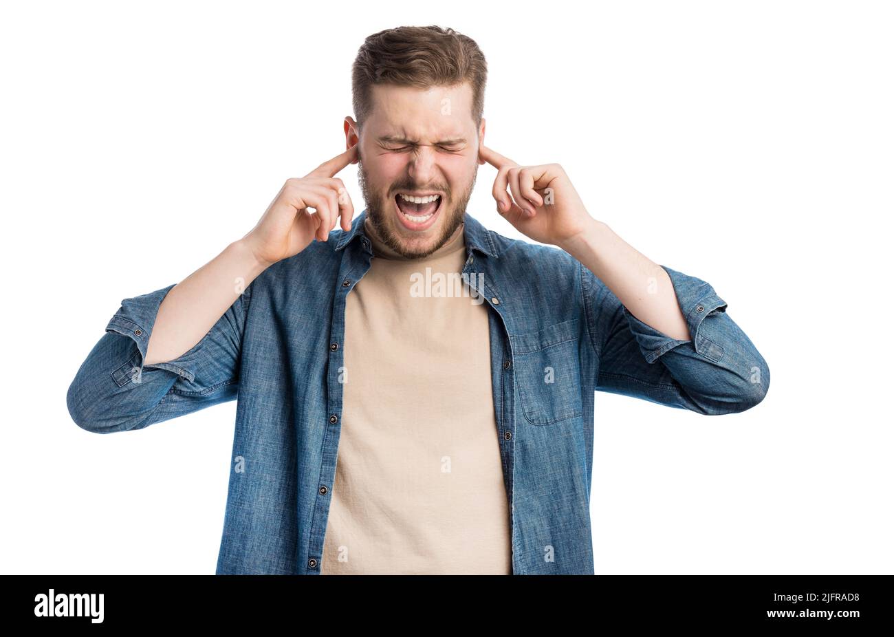 Annoyed man covering ears Stock Photo