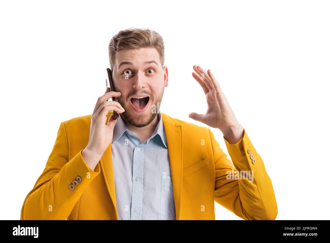 Man with smartphone expressing surprise Stock Photo