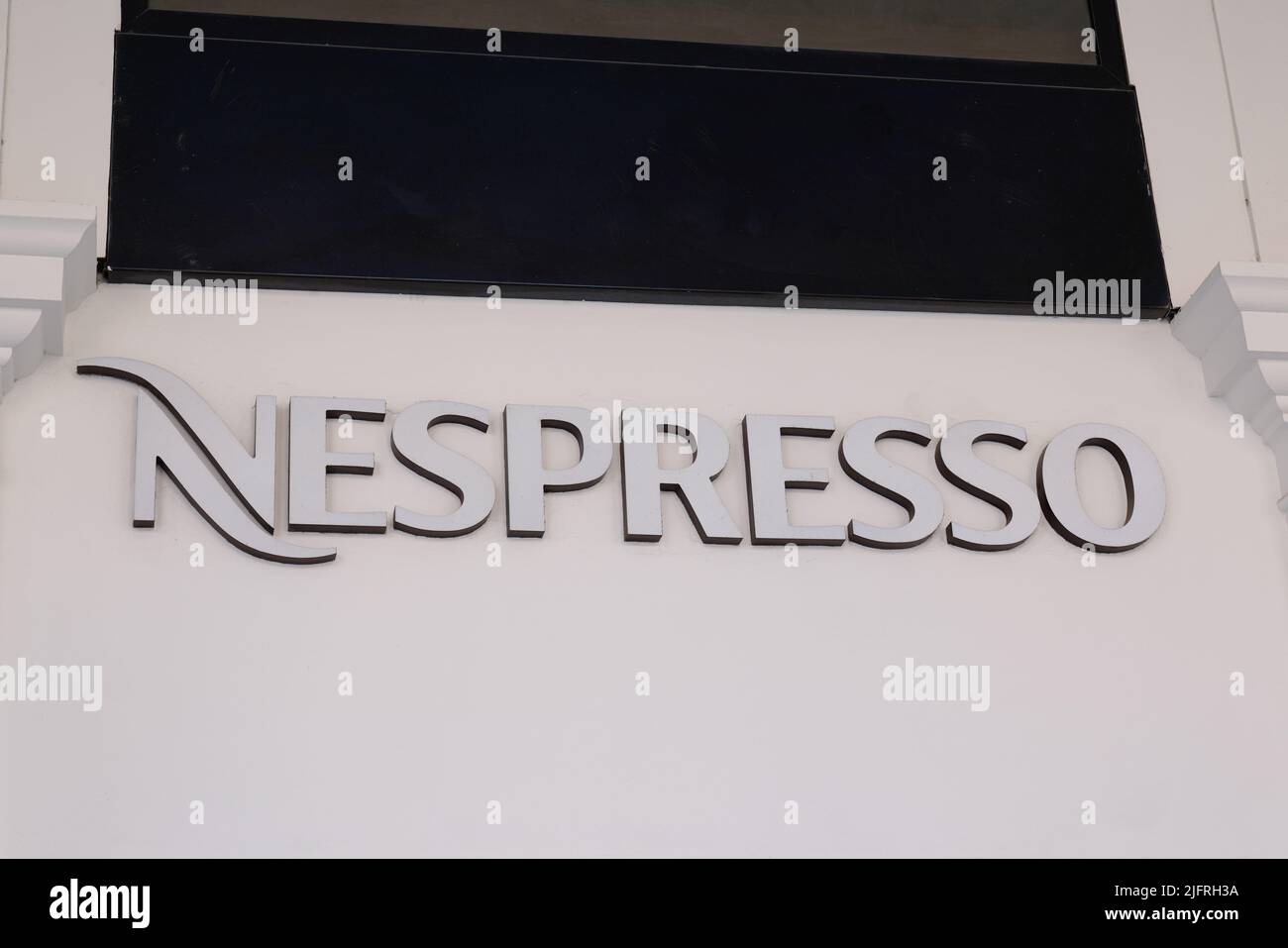 Bordeaux , Aquitaine  France - 06 10 2022 : Nespresso logo sign and text brand of coffee machines front wall facade shop on store capsules and accesso Stock Photo
